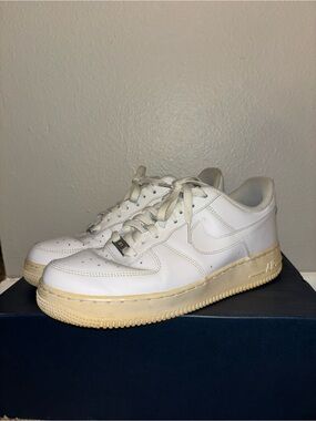 Nike Air Force 1 White Leather Sneakers with Yellowed Cream Sole